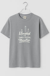 Moss Mountain Outfitters "I Smoked the Three Sisters Marathon" tee — white, for everyday.